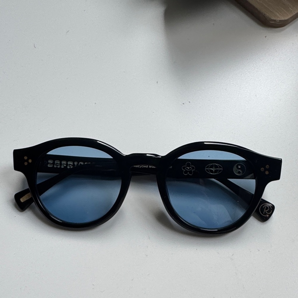 RAEN Black Sunglasses with Blue Lenses